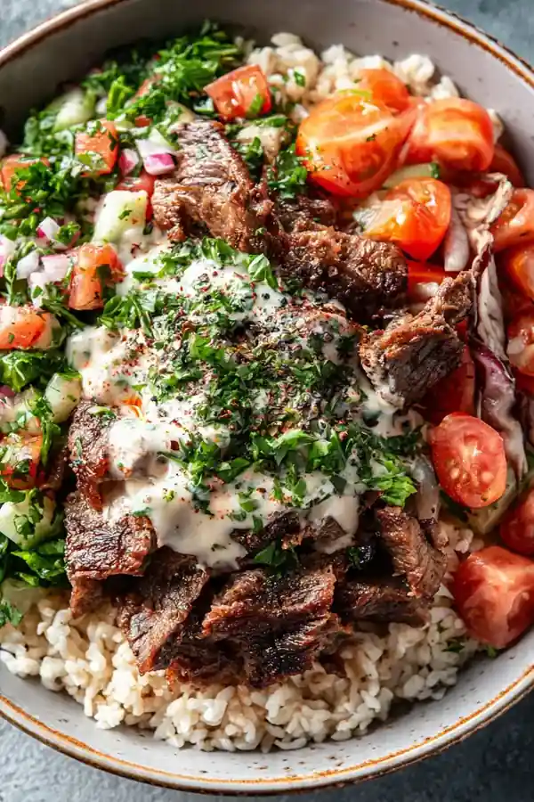 Beef Shawarma Bowl with Herb Salad and Lemon Garlic Dressing