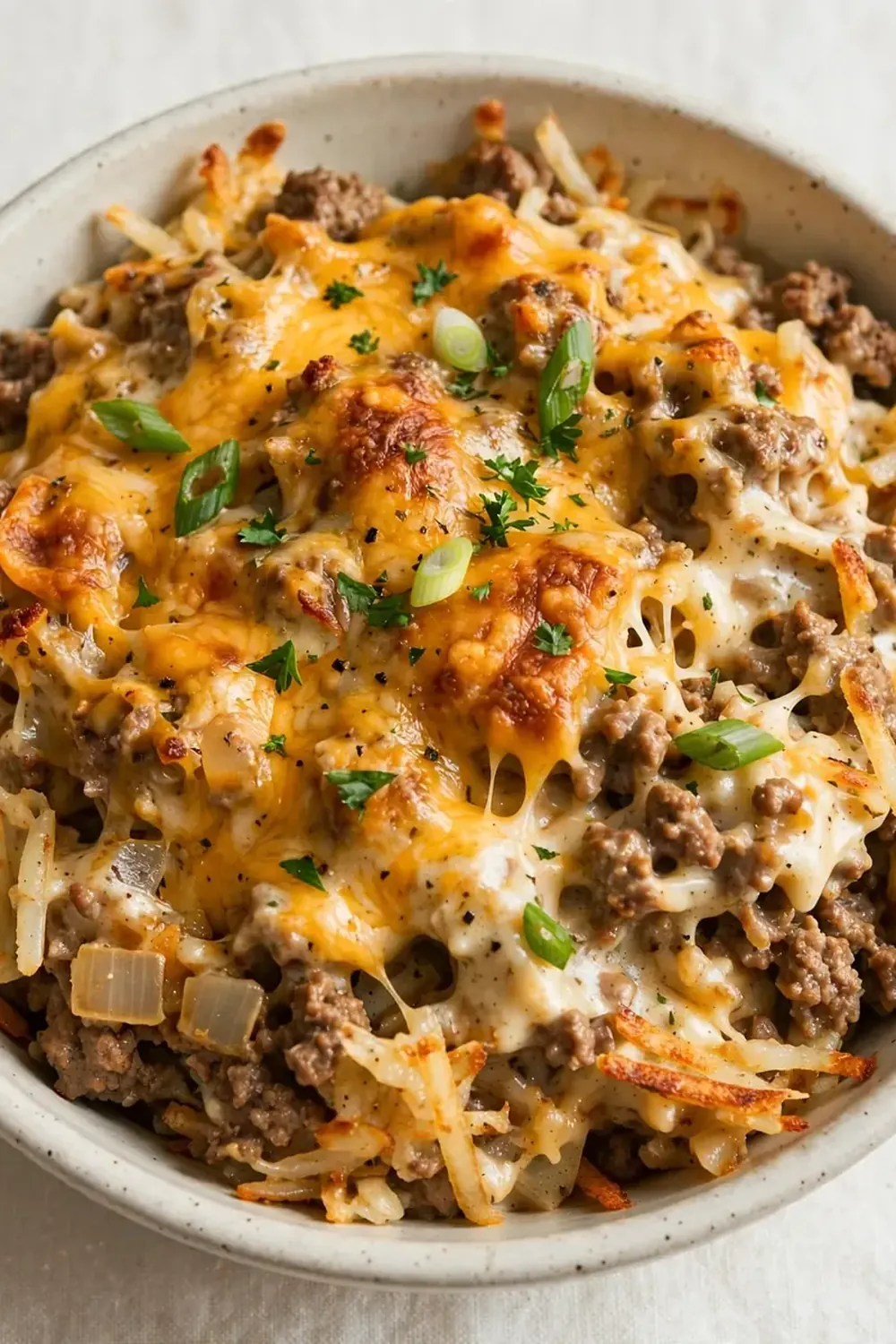 Crockpot Cheesy Beef and Hash Brown Casserole